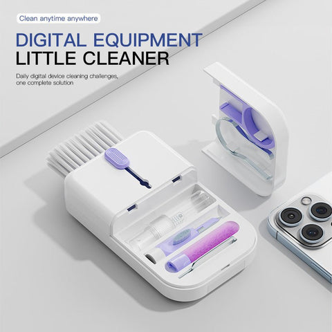11-in-1 multifunctional digital device cleaning kit with brushes, spray, and tools next to smartphone