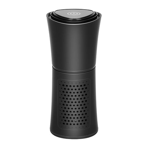 Compact black air purifier with perforated vents and touch power button on top