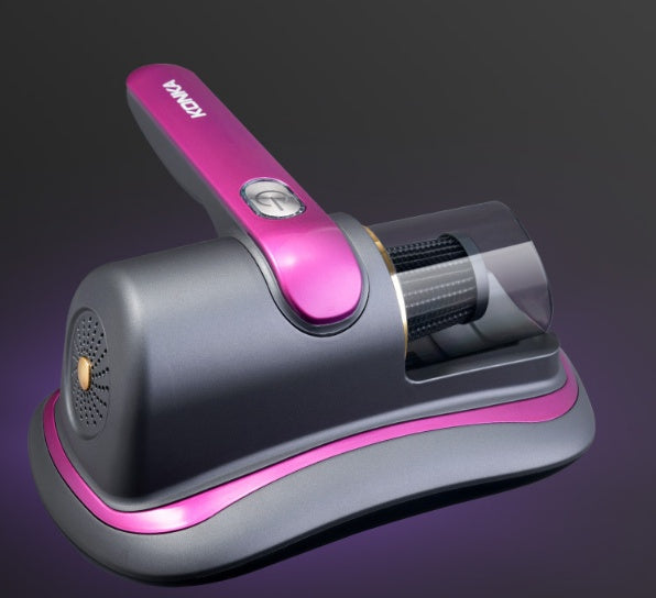 Compact gray and pink kitchen appliance with cylindrical grinder and handle on purple background