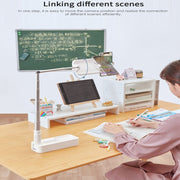 3-in-1 foldable LED fill light and smartphone stand on desk with woman studying and digital board