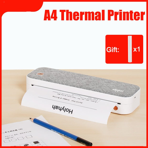 Compact A4 thermal printer with gray fabric top printing a document on wooden desk with pencil and paper