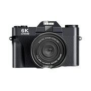 Black 6K Ultra HD digital mirrorless camera with 16X zoom and macro lens on white background