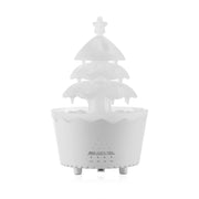 white Christmas tree shaped essential oil diffuser with timer settings on front