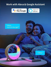 Couple enjoying movie night on couch with colorful smart atmosphere lamp and Alexa voice control
