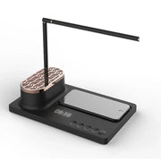 Modern black desk lamp with wireless charger, Bluetooth speaker, digital clock, and control buttons