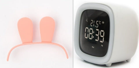 Modern digital desk clock with thermostat display showing time 08:39 and temperature 21.5°C