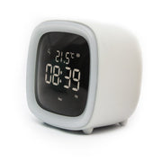 Compact digital desk clock with white casing showing time 08:39 PM and temperature 21.5°C