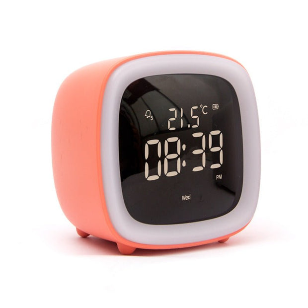 Orange digital desk clock displaying time 08:39 PM, temperature 21.5°C, and weekday Wed