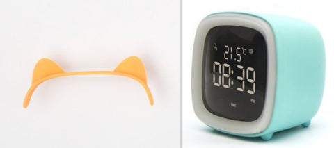 Digital desk clock with thermostat in light blue casing showing time and temperature