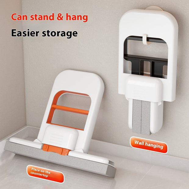 Compact handheld mini mop with orange and white design, standing on countertop and wall hanging for easy storage
