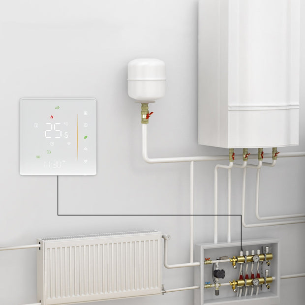 Modern wall-mounted smart thermostat displaying 25.5°C connected to home heating system with radiator and pipes