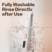 White rechargeable pet paw trimmer submerged in water highlighting its fully washable feature