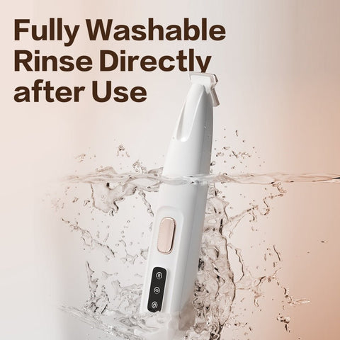 White rechargeable pet paw trimmer submerged in water highlighting its fully washable feature