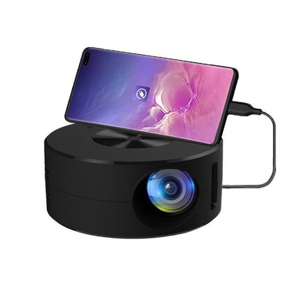 Black portable mini projector connected to smartphone displaying colorful screen, USB cable attached