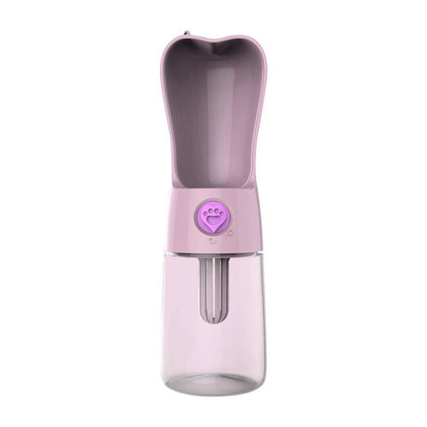 Portable pink pet water bottle with built-in bowl and paw print button for dogs and cats