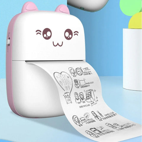 Cute portable Bluetooth thermal printer with cartoon face printing black line art on paper