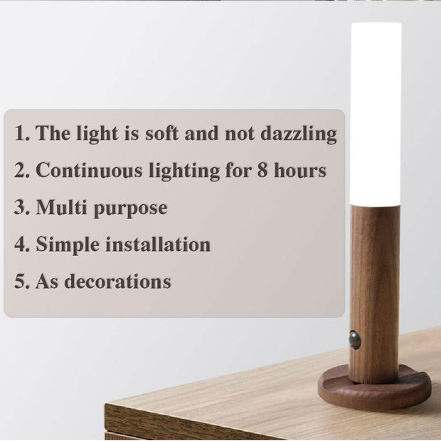 Modern wooden sensor wall lamp emitting soft light on wooden table with product features text