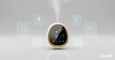 Smart aroma diffuser with digital clock, temperature display, and mist output, surrounded by feature icons