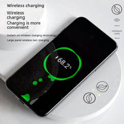 Smart wireless charging speaker lamp with black smartphone showing 68.2% battery on white surface