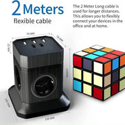 Black smart cube power socket with multiple outlets and 2-meter flexible cable next to a colorful Rubik's cube