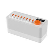 White smart sleeping speaker with orange dial, multiple buttons, and digital clock display