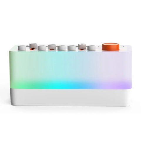 modern sleep speaker with colorful gradient light and white controls, orange dial on top