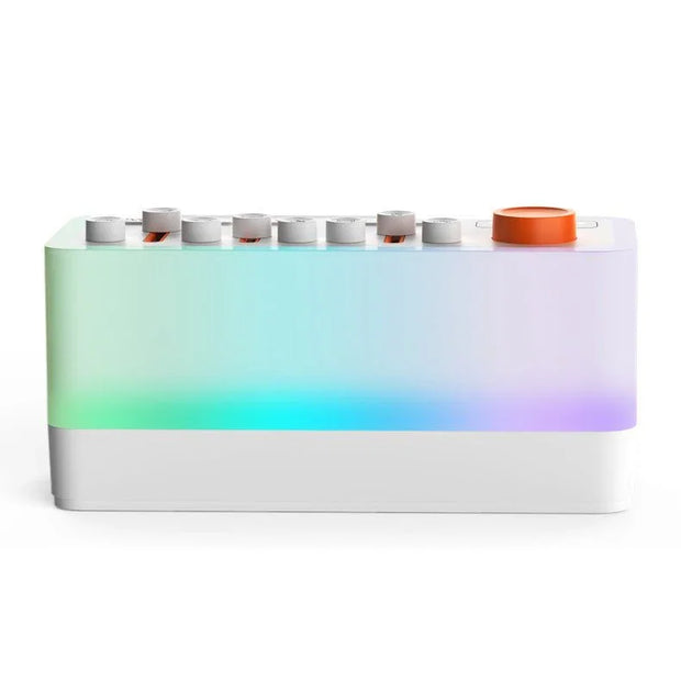 modern sleep speaker with colorful gradient light and white controls, orange dial on top