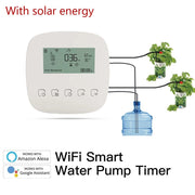 WiFi smart water pump timer with LCD screen controlling irrigation of two potted plants from a water container