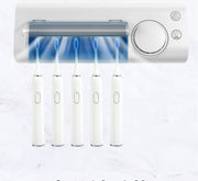 Wall-mounted UV toothbrush sterilizer with five white electric toothbrushes under UV light