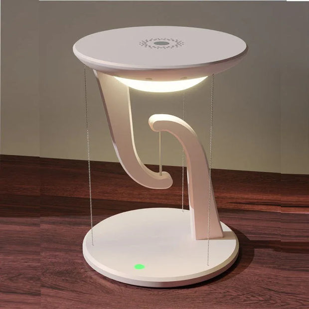 modern wireless floating charger with white circular design and glowing light on wooden surface